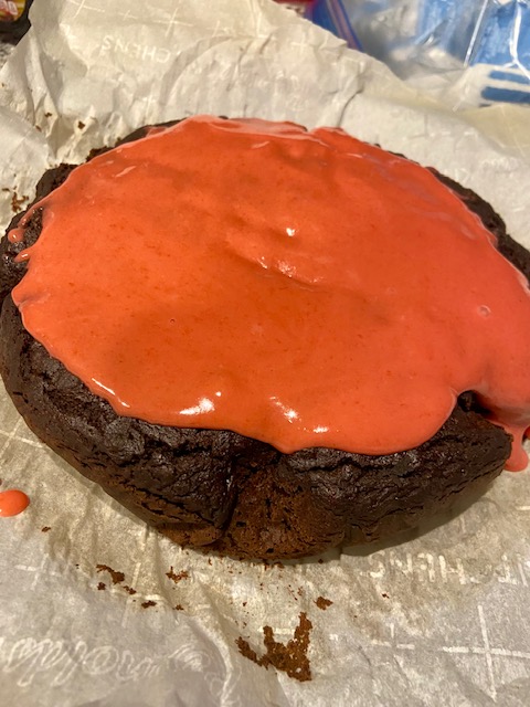 Chocolate cake with pink raspberry glaze